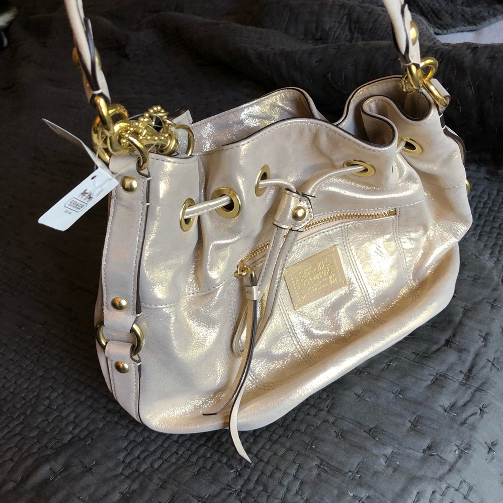 Brand new gold coach bag